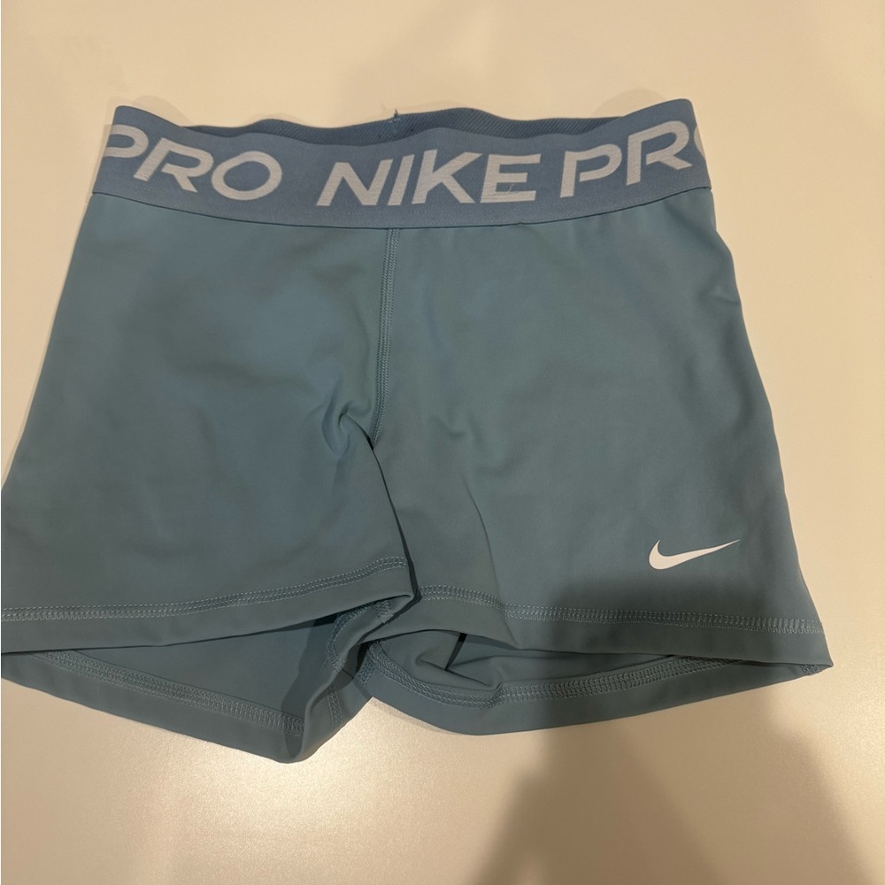 Light blue Nike pros